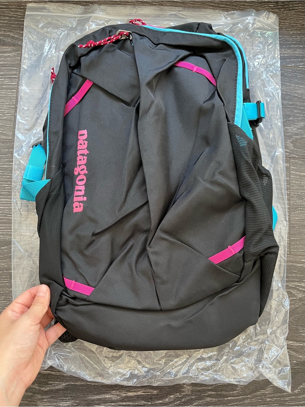 Patagonia Black Backpack with Pink & Teal Highlights